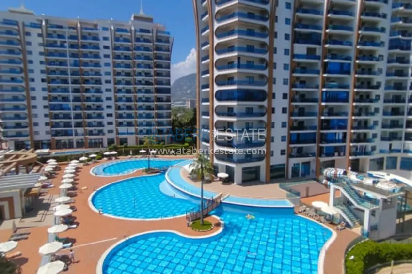 Приобрести Квартира 2+1 с видом на море и горы, меблированная район Махмутлар – Алания 14 