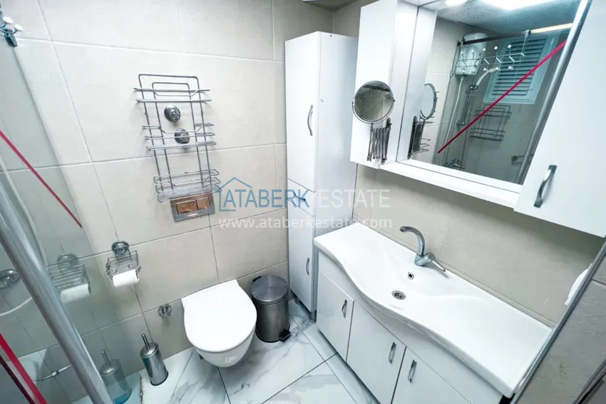 Приобрести Просторная двухкомнатная квартира с мебелью и камином в районе Алании – Конаклы 15 