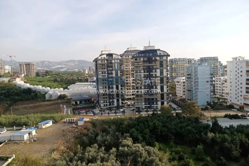 Приобрести Квартира 3+1 с отдельной кухней в новом комплексе, район Махмутлар – Алания 18 