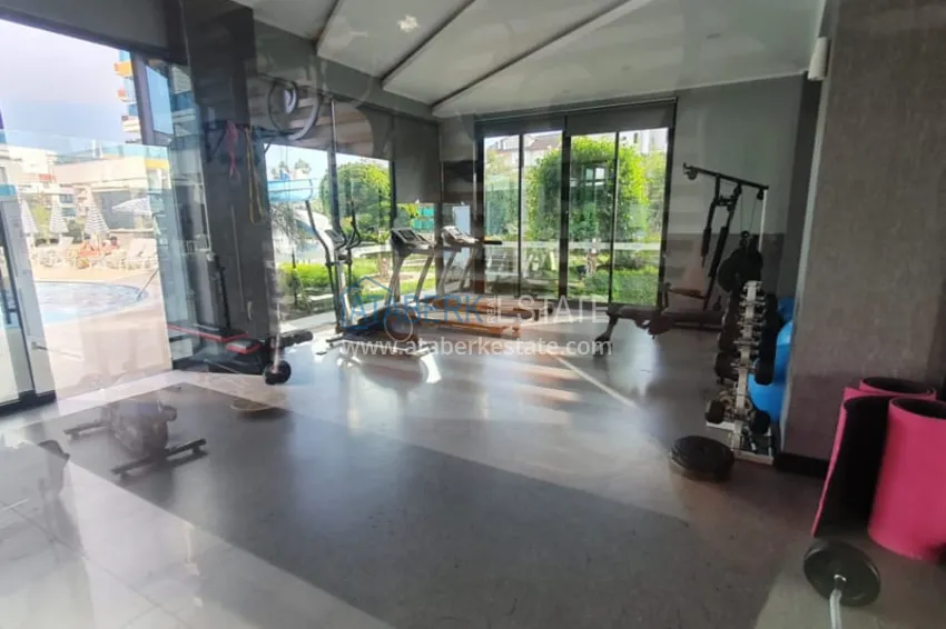 Квартира 1+1 с мебелью рядом с морем в районе открытом для ВНЖ, Тосмур  18 