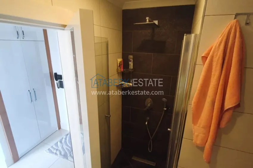 Приобрести Квартира 1+1 с мебелью рядом с морем в районе открытом для ВНЖ, Тосмур  19 