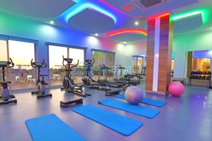 Квартира 1+1 меблированная с застеклённым балконом и видом на море, район Авсаллар – Алания 21 