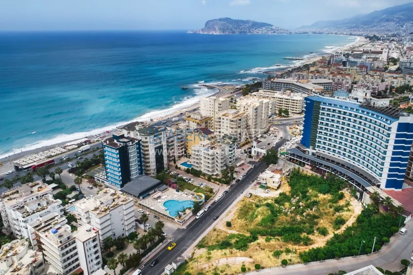 Квартиры 1+1 от инвестора в строящемся комплексе премиум-класса в 120 метрах от моря – Тосмур, Алания 1 