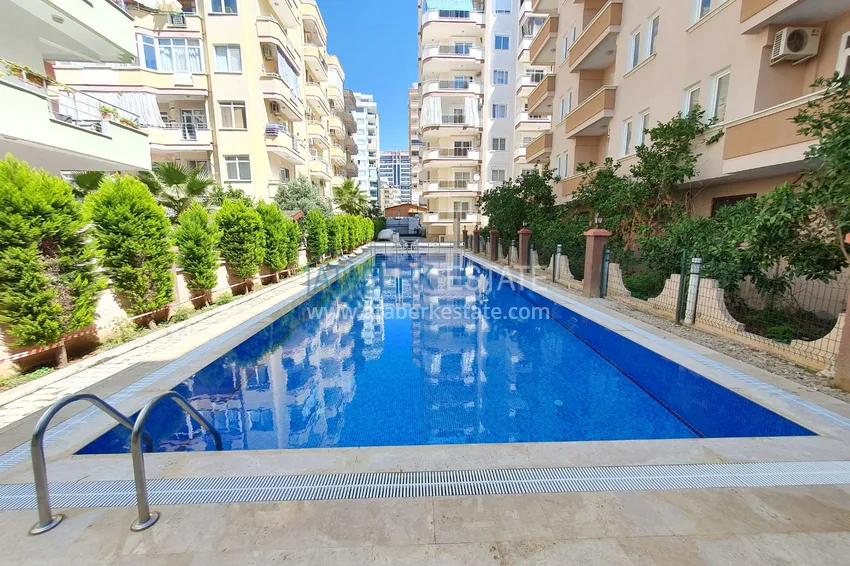 Двухкомная квартира в Махмутларе с мебелью в комплексе с бассейном 2 