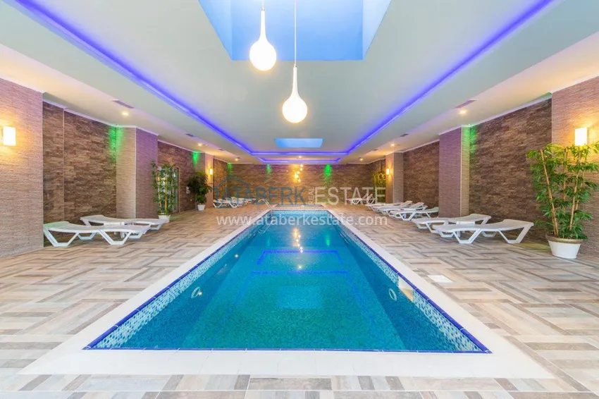 Дуплекс 4+1 с выходом в сад в Кестеле меблированный в элитной резиденции 20 