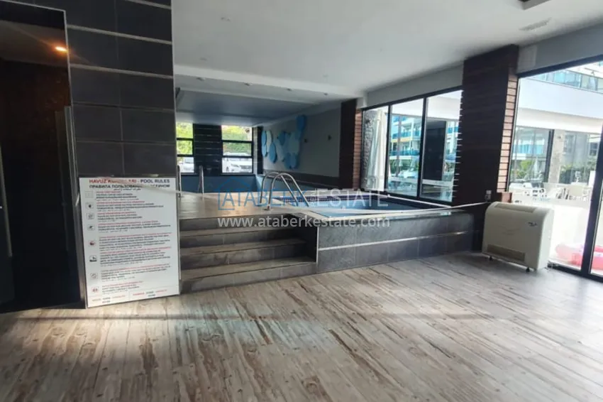 Квартира 1+1 с мебелью рядом с морем в районе открытом для ВНЖ, Тосмур  21 