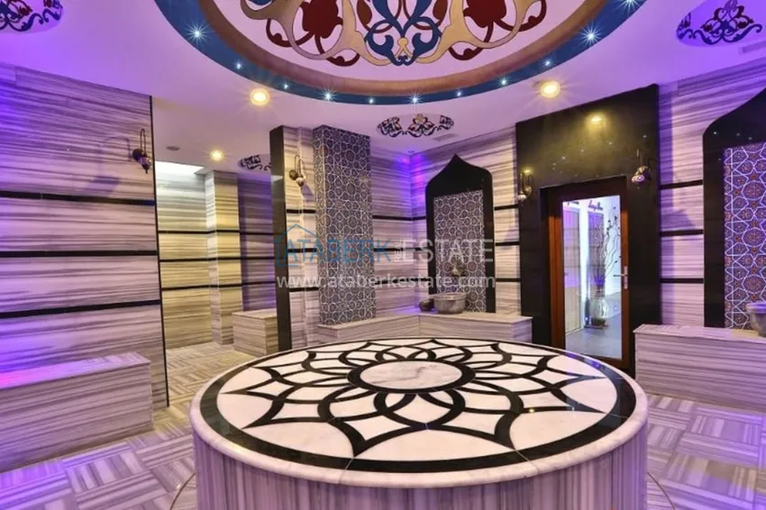 Квартира 1+1 меблированная с застеклённым балконом и видом на море, район Авсаллар – Алания 25 