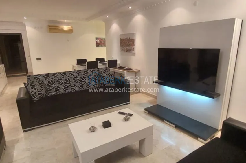 Приобрести Квартира в районе Джикджилли - Алания с мебелью и застеклёнными балконами 2 