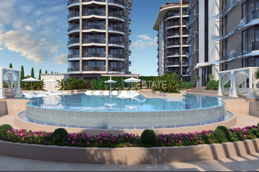 Квартиры 1+1 от инвестора в строящемся комплексе премиум-класса в 120 метрах от моря – Тосмур, Алания 3 