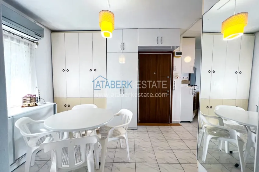 Приобрести Просторная двухкомнатная квартира с мебелью и камином в районе Алании – Конаклы 2 