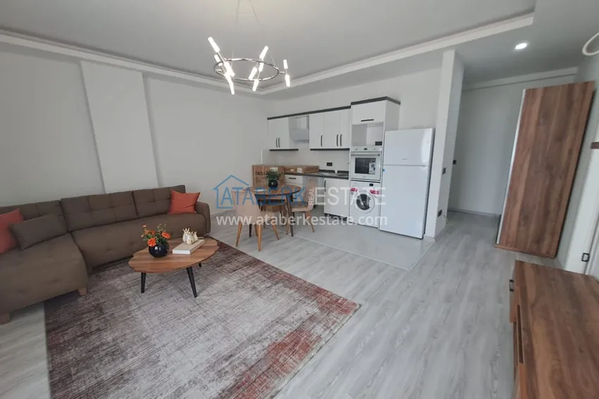 Приобрести Квартира 1+1 с новой мебелью в современной новостройке - район Махмутлар, Алания 2 