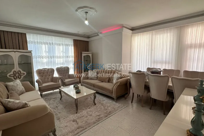 Приобрести Трехкомнатная квартира с открытым видом на горы и море в центре Алании 1 