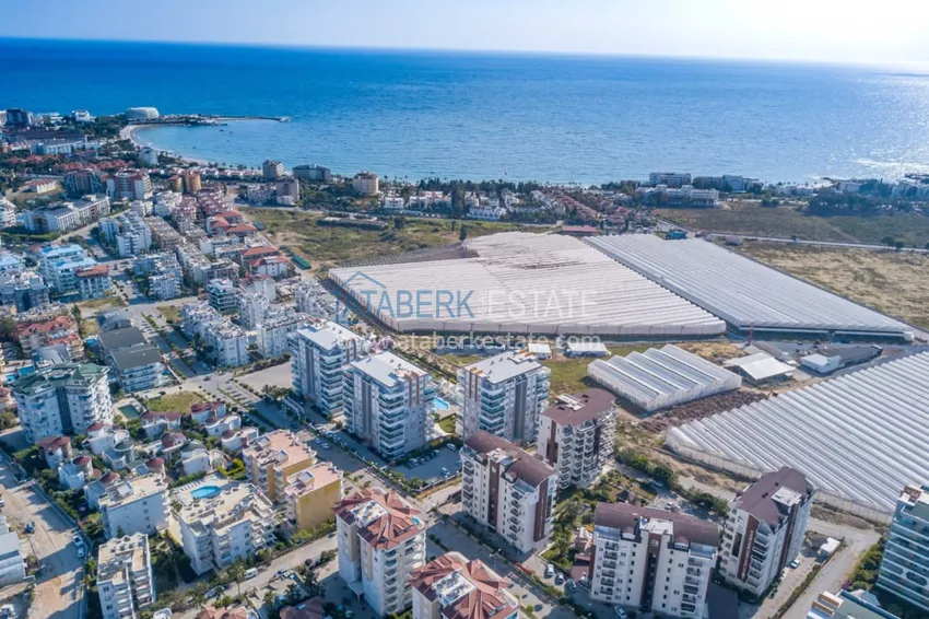 Квартира 1+1 меблированная с застеклённым балконом и видом на море, район Авсаллар – Алания 30 