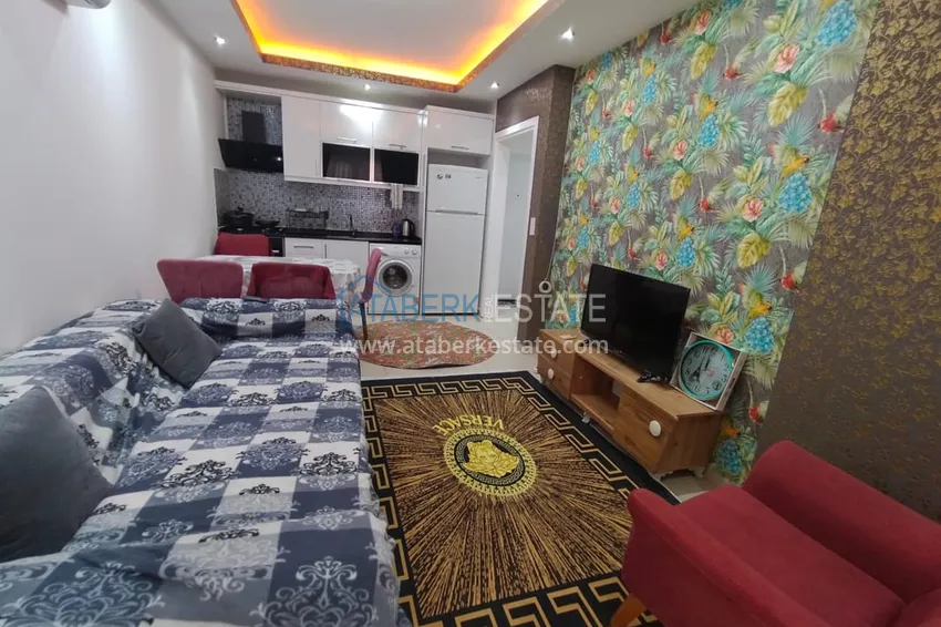 Приобрести Двухкомная квартира в Махмутларе с мебелью в комплексе с бассейном 5 