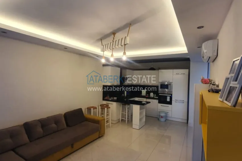 Приобрести Квартира 1+1 с мебелью рядом с морем в районе открытом для ВНЖ, Тосмур  5 