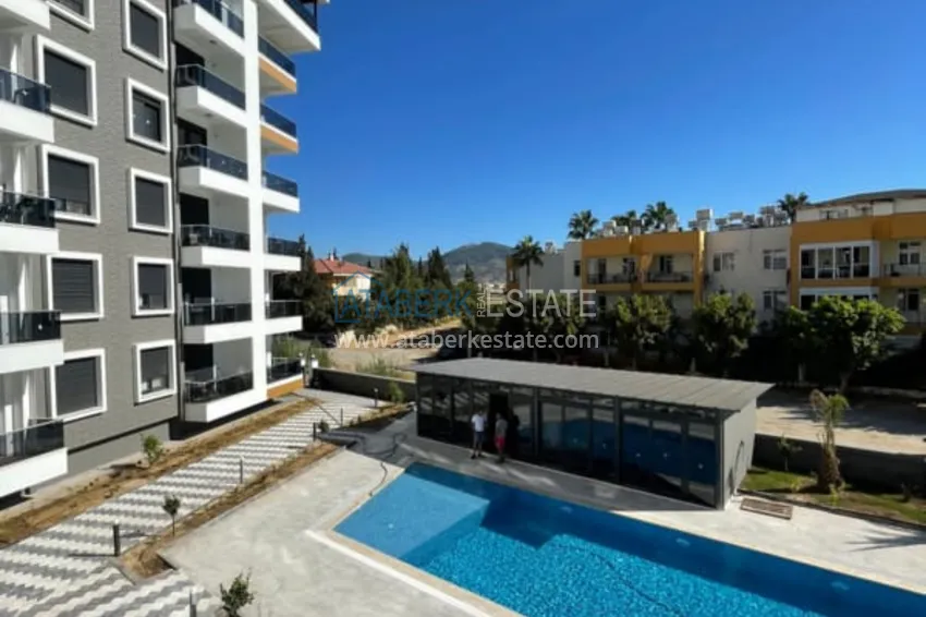 Квартира 1+1 меблированная с застеклённым балконом и видом на море – новостройка, Газипаша 4 