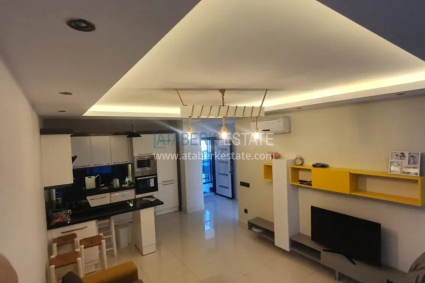 Приобрести Квартира 1+1 с мебелью рядом с морем в районе открытом для ВНЖ, Тосмур  6 