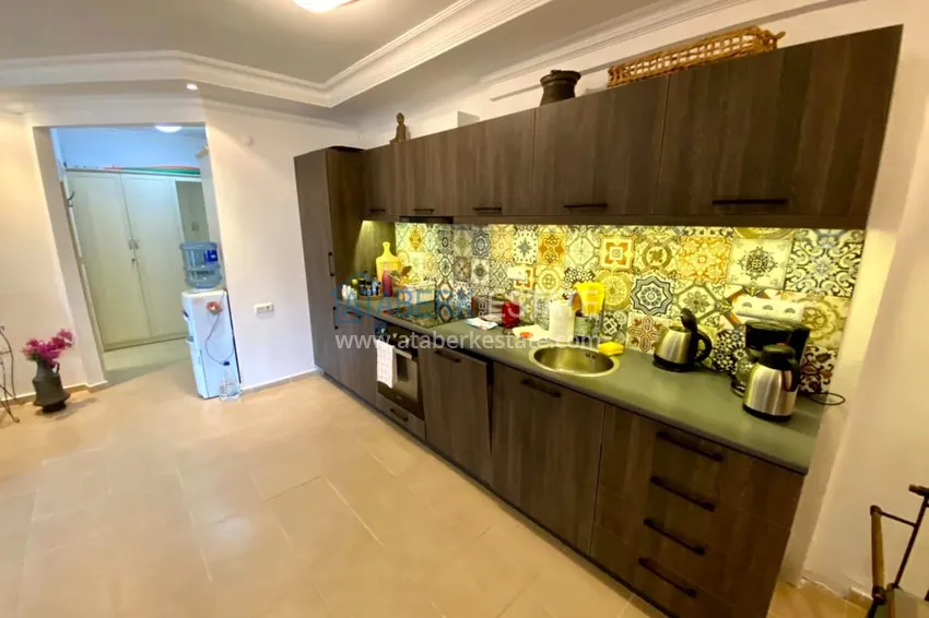 Приобрести Квартира 2+1 меблированная с застеклёнными балконами и видом на горы, район Тосмур – Алания 6 