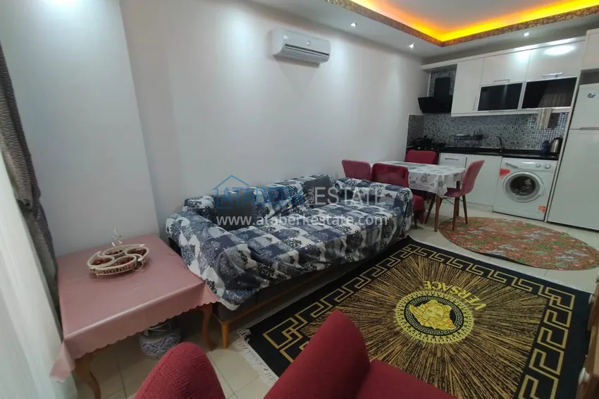 Приобрести Двухкомная квартира в Махмутларе с мебелью в комплексе с бассейном 8 