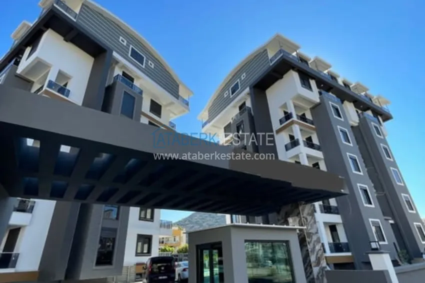 Квартира 1+1 меблированная с застеклённым балконом и видом на море – новостройка, Газипаша 7 