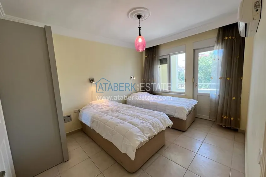 Приобрести Квартира 2+1 с мебелью в уютном комплексе всего в 250 метрах от моря, район Оба – Алания 8 