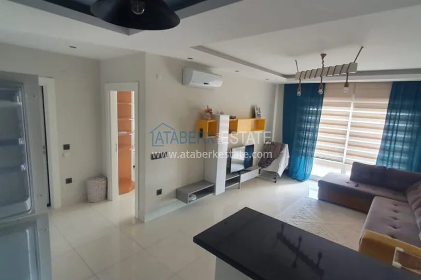 Приобрести Квартира 1+1 с мебелью рядом с морем в районе открытом для ВНЖ, Тосмур  10 