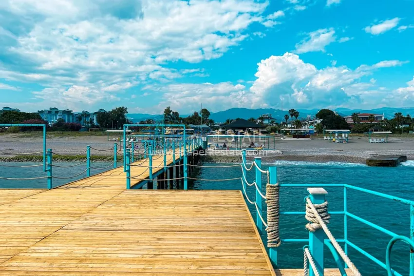 Просторная двухкомнатная квартира с мебелью и камином в районе Алании – Конаклы 9 