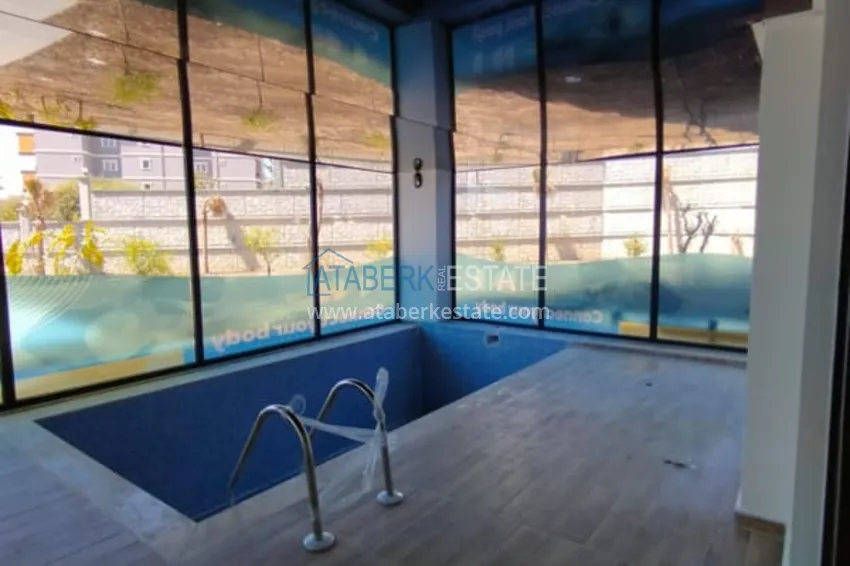 Апартаменты с чистовой отделкой в районе Авсаллар в новостройке 9 