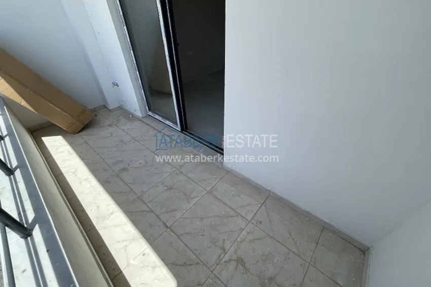 Приобрести Квартира 1+1 с видом на море и горы в районе Эрдемли-Мерсин 14 