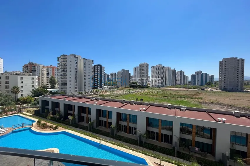 Приобрести Срочная продажа! Квартира 1+1 в 300 метрах от моря в новом жилом комплексе в районе Арпачбахшиш-Мерсин 22