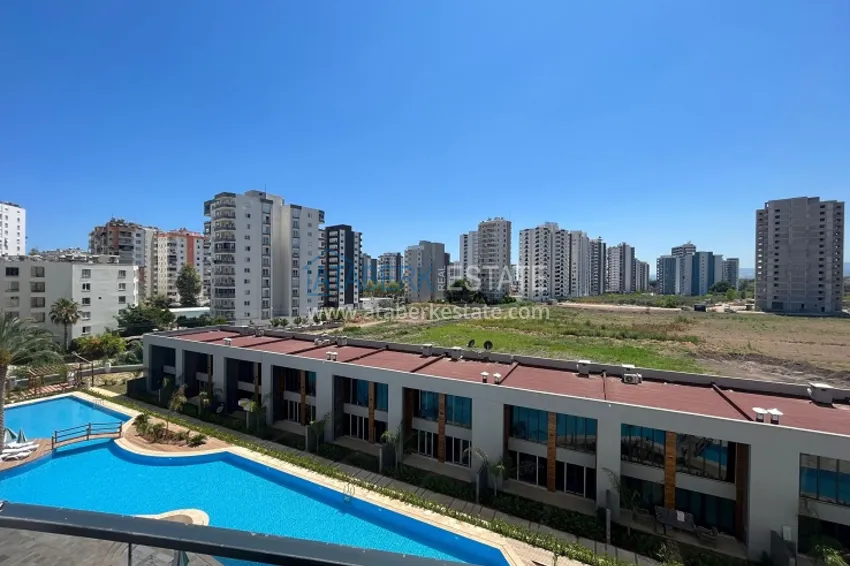 Приобрести Срочная продажа! Квартира 1+1 в 300 метрах от моря в новом жилом комплексе в районе Арпачбахшиш-Мерсин 26