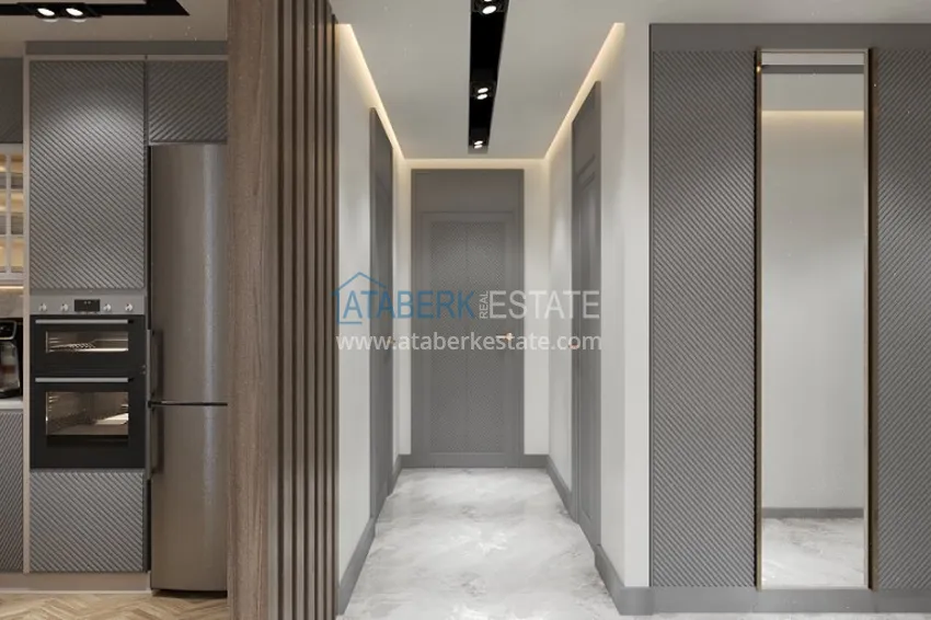 Приобрести Квартиры 2+1 на этапе строительства в районе Давултепе-Мерсин 12 