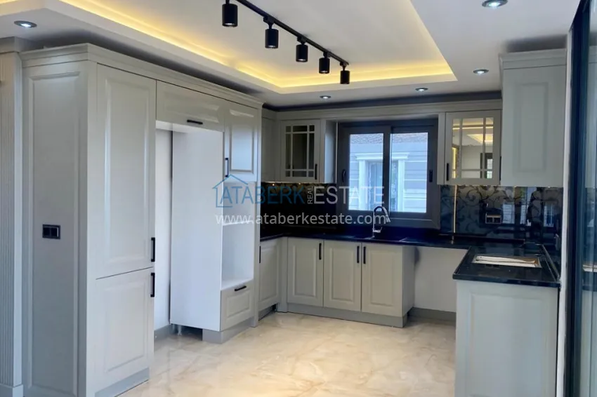 Приобрести Вилла 5+2 на заключительном этапе строительства с видом на море в районе Торослар города Мерсин 7 