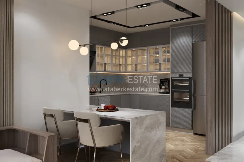 Приобрести Квартиры 2+1 на этапе строительства в районе Давултепе-Мерсин 10 