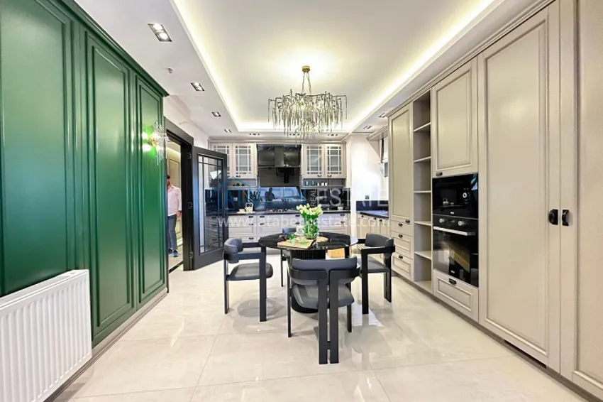 Приобрести Квартира 5+1 в жилом комплексе на стадии строительства Мезитли-Мерсин 14 