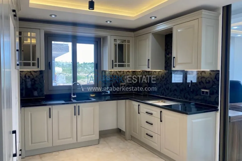 Приобрести Вилла 5+2 на заключительном этапе строительства с видом на море в районе Торослар города Мерсин 8 