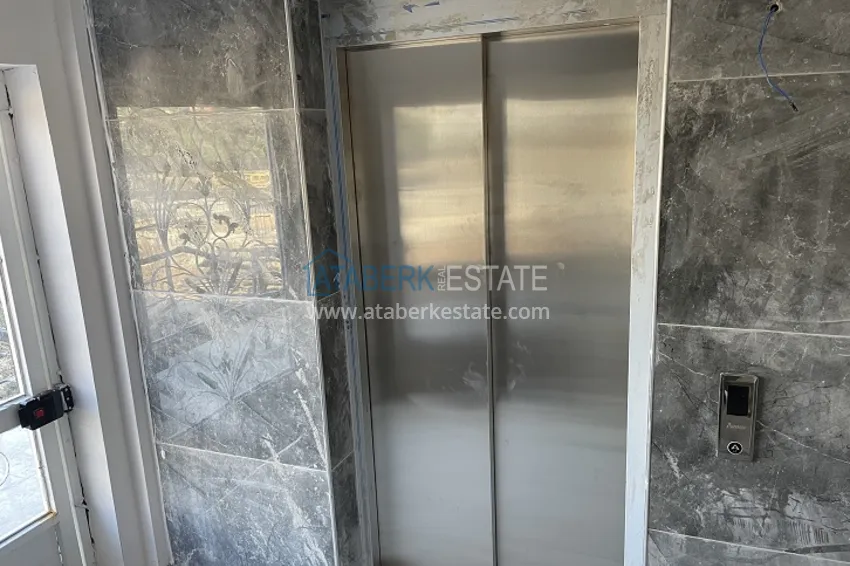 Приобрести Квартира 1+1 с видом на море и горы в районе Эрдемли-Мерсин 18 