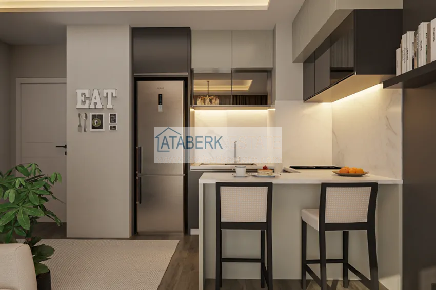 Приобрести Квартира 1+1 на этапе строительства в 200 метрах от моря в районе Тедже-Мерсин 1 