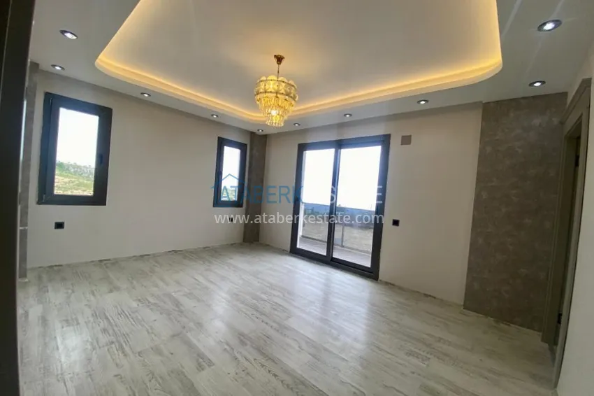 Приобрести Вилла 5+2 на заключительном этапе строительства с видом на море в районе Торослар города Мерсин 3 