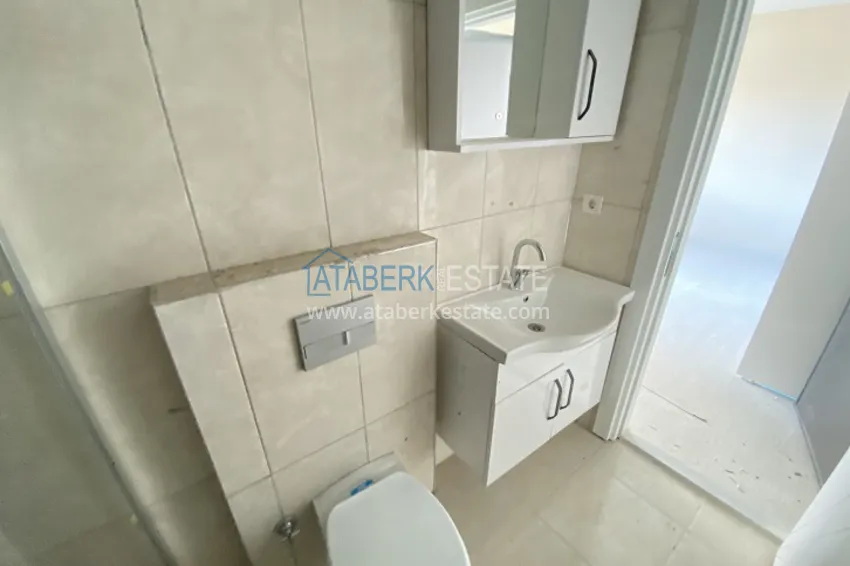 Приобрести Квартира 1+1 с видом на море и горы в районе Эрдемли-Мерсин 11 