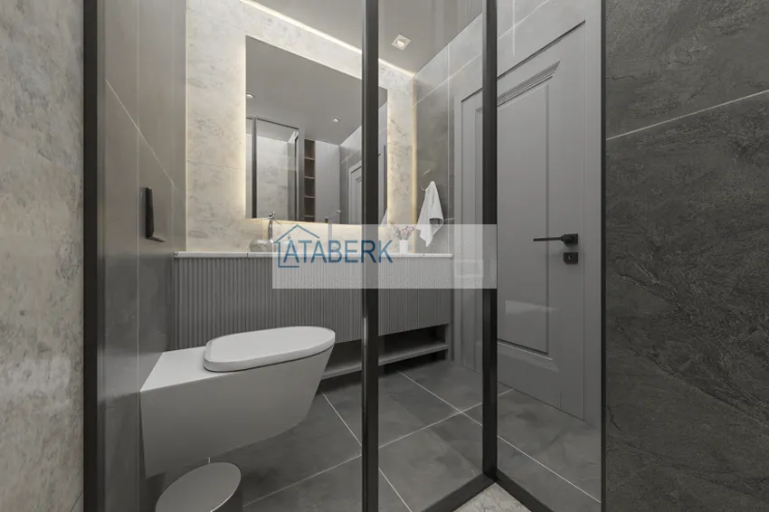 Приобрести Квартира 1+1 на этапе строительства в 200 метрах от моря в районе Тедже-Мерсин 28 