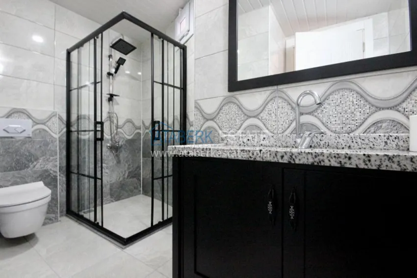 Приобрести Дуплекс 5+1 с чистовой отделкой в 50 метрах от моря район Акдениз-Мерсин 30 