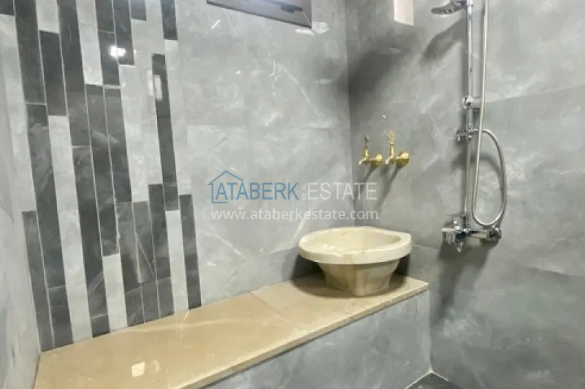 Приобрести Вилла 5+2 на заключительном этапе строительства с видом на море в районе Торослар города Мерсин 18 