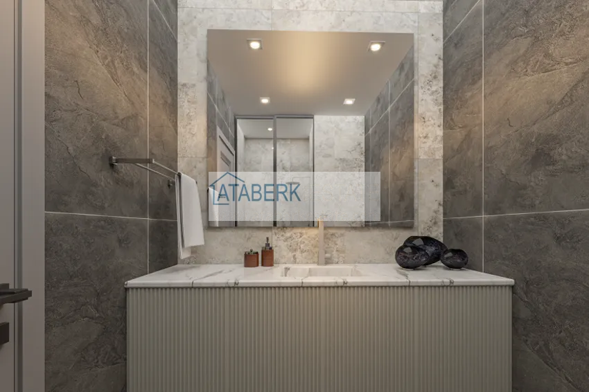 Приобрести Квартира 1+1 на этапе строительства в 200 метрах от моря в районе Тедже-Мерсин 29 