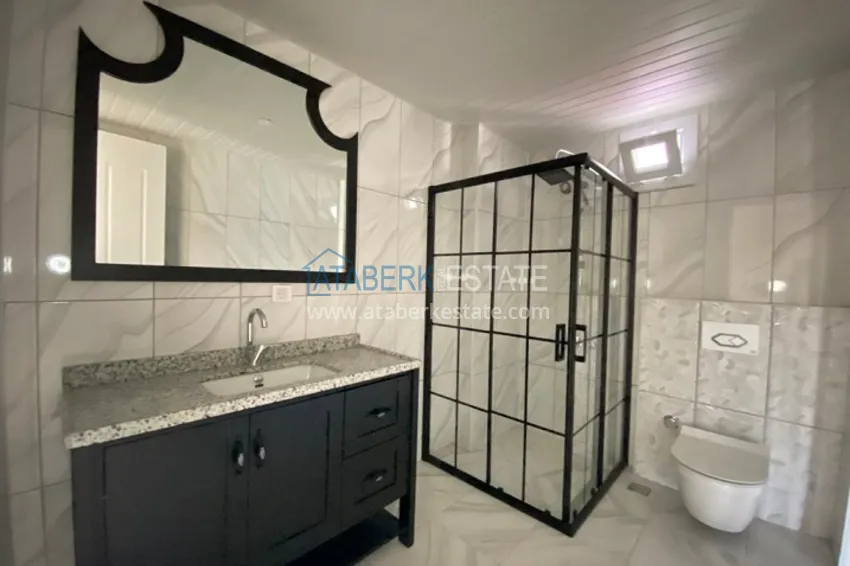 Приобрести Дуплекс 5+1 с чистовой отделкой в 50 метрах от моря район Акдениз-Мерсин 31 