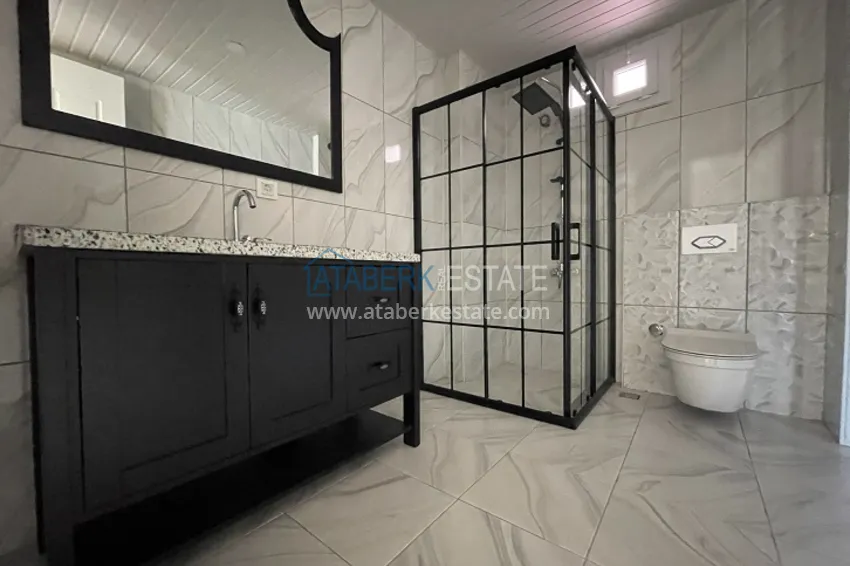 Приобрести Дуплекс 5+1 с чистовой отделкой в 50 метрах от моря район Акдениз-Мерсин 32 