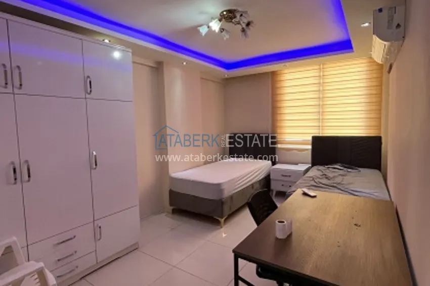 Приобрести Квартира 3+1 меблированная с открытым видом на море в районе Акдениз-Мерсин 10 