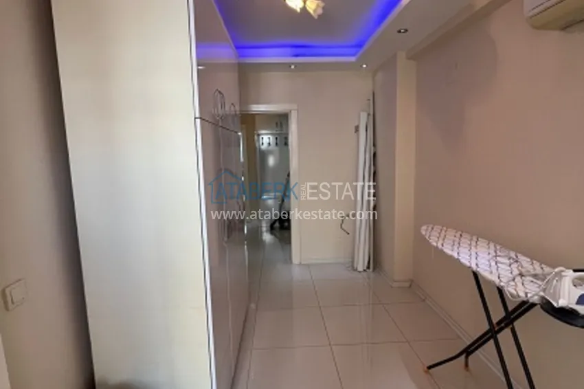 Приобрести Квартира 3+1 меблированная с открытым видом на море в районе Акдениз-Мерсин 12 