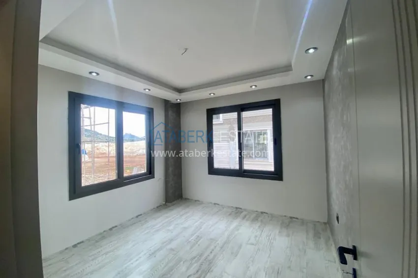 Приобрести Вилла 5+2 на заключительном этапе строительства с видом на море в районе Торослар города Мерсин 6 