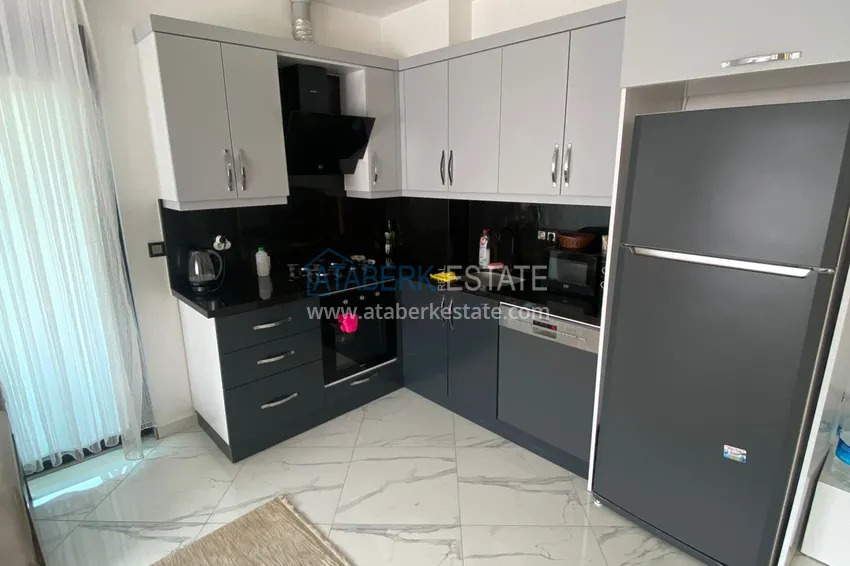 Приобрести Квартира 2+1 «под ключ» в районе Оба в комфортабельном жилом комплексе 10 